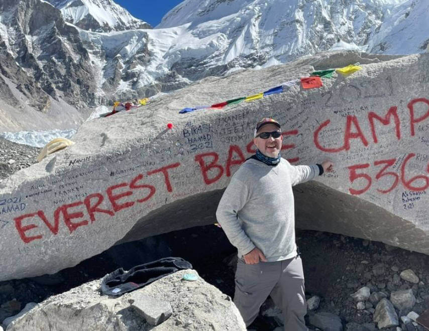 Man Wearing Light Grey Alpaca Wool Hoodie at Mount Everest Base Camp - PAKA Apparel