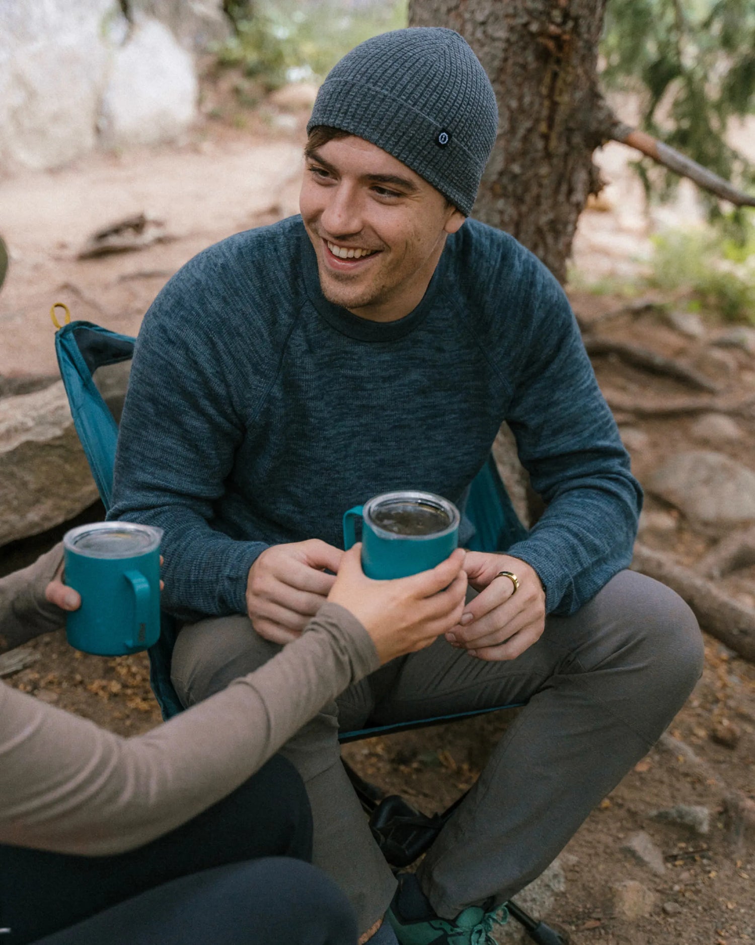 Man in Camping Chair with Coffee Wearing Cozy Navy Blue Alpaca Wool Crewneck Sweater – PAKA The Original Crew