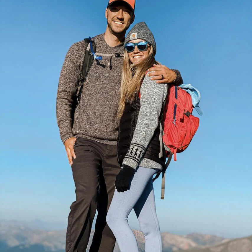 Couple Wearing Alpaca Wool Hiking Sweaters on Top of Mountain - PAKA Apparel