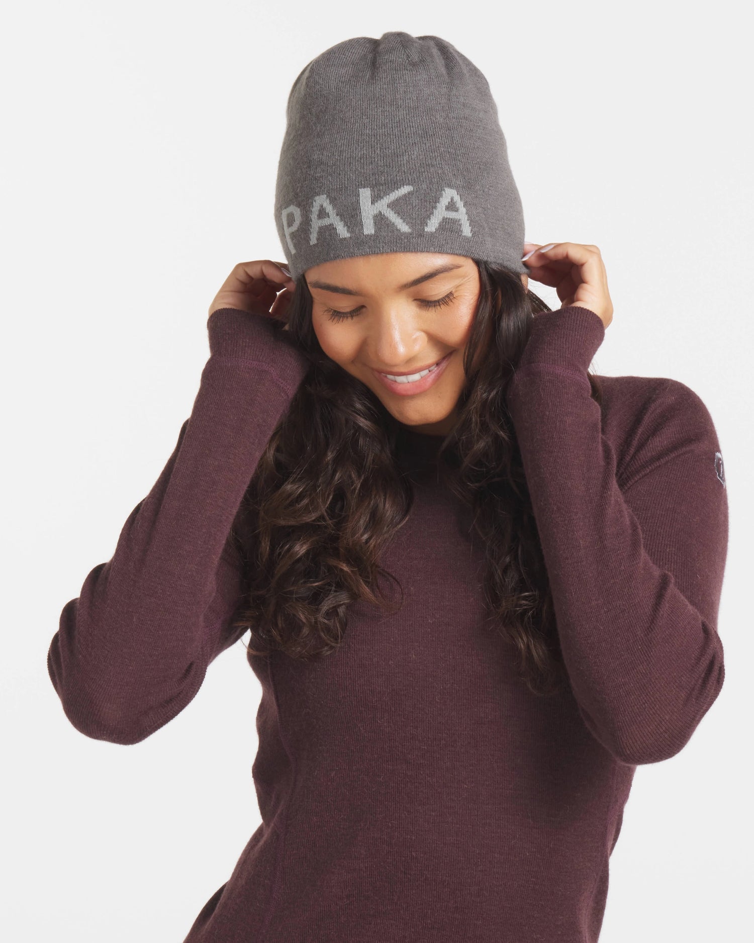 Woman Wearing Forage / Grey Skullcap Alpaca Beanie from Peru – PAKA Apparel