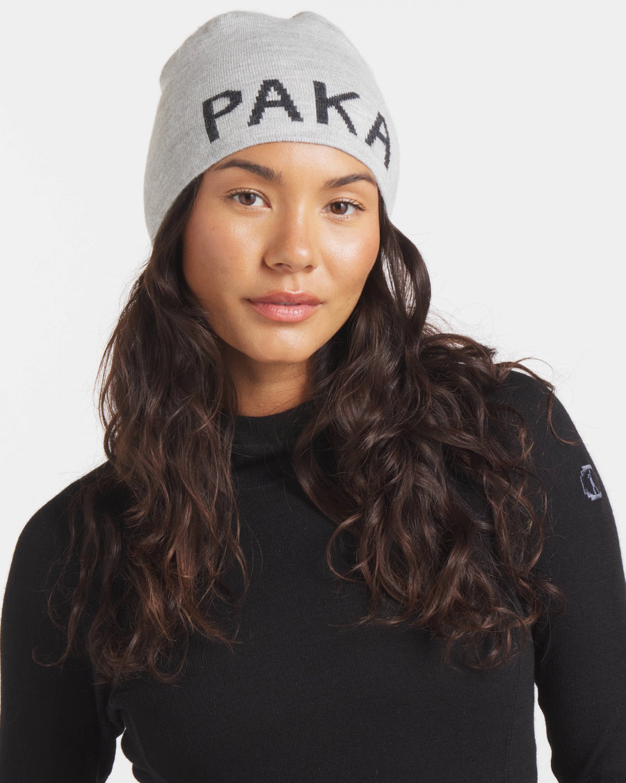 Woman wearing skullcap beanie