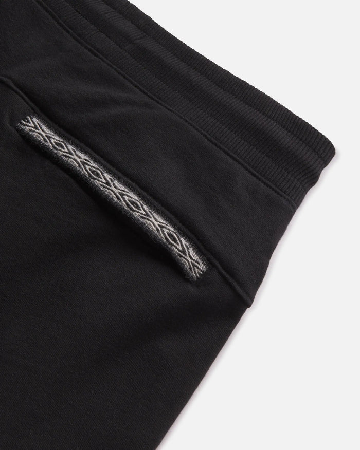 Close-up photo of the handwoven Inca ID on Paka Joggers