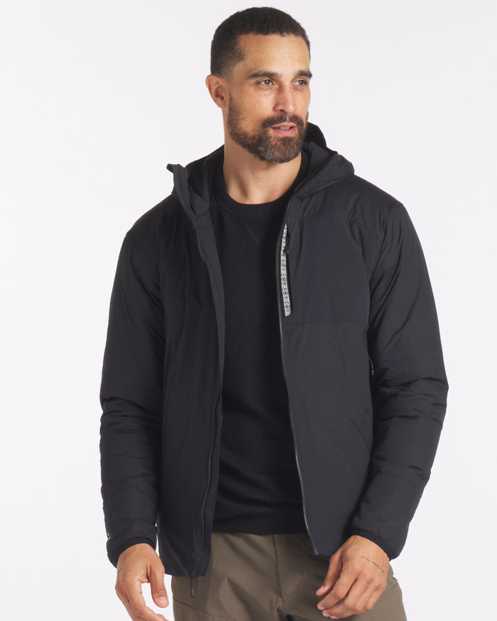 Man in Unzipped Black Apu Lightweight Puffer Jacket with Hood – PAKA Apparel