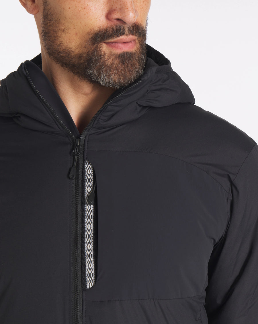 Closeup Torso Shot with Inca ID on Men's Apu Lightweight Puffer Jacket in Black – PAKA Apparel