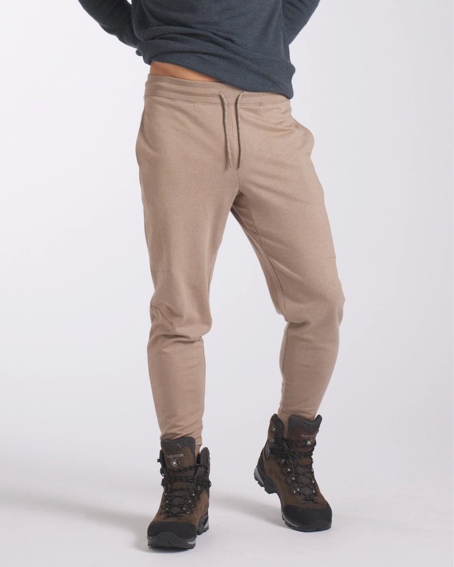 Lower Half of Man Wearing Boots with Walnut / Tan Everyday Alpaca Wool Blend Joggers / Sweatpants for Casual and Camping – PAKA Apparel