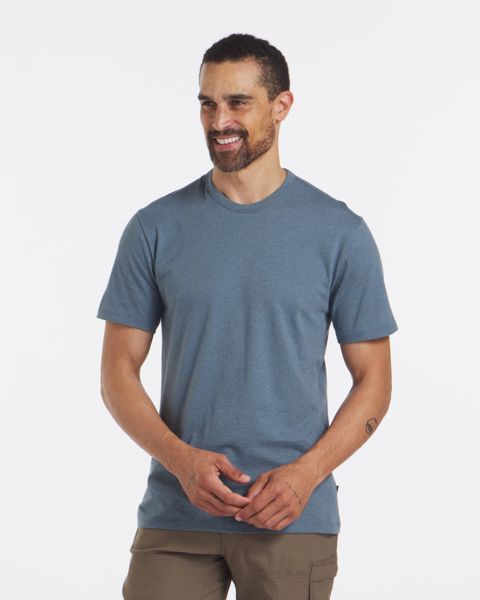 A smiling man wearing Blue Men's Alpaca Wool Tee Shirt  