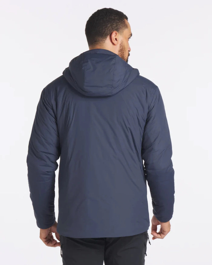 Backside of Man in Navy Blue Apu Lightweight Sustainable Puffer Jacket – PAKA Apparel