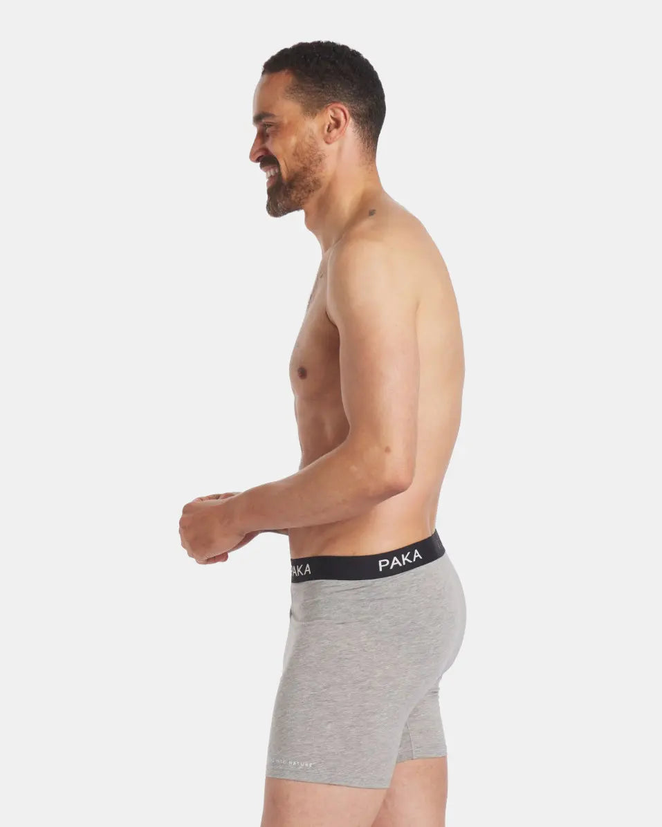 Side Profile of Smiling Man in Men's Grey Odor-Resistant Alpaca Natural Underwear Boxer Briefs – PAKA Apparel