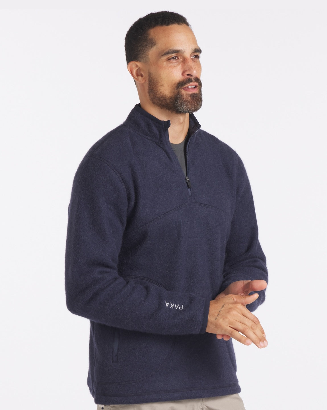 Man with Hands Clasped in PAKACLOUD™ Navy Blue Natural Alpaca Fleece Jacket – PAKA Apparel