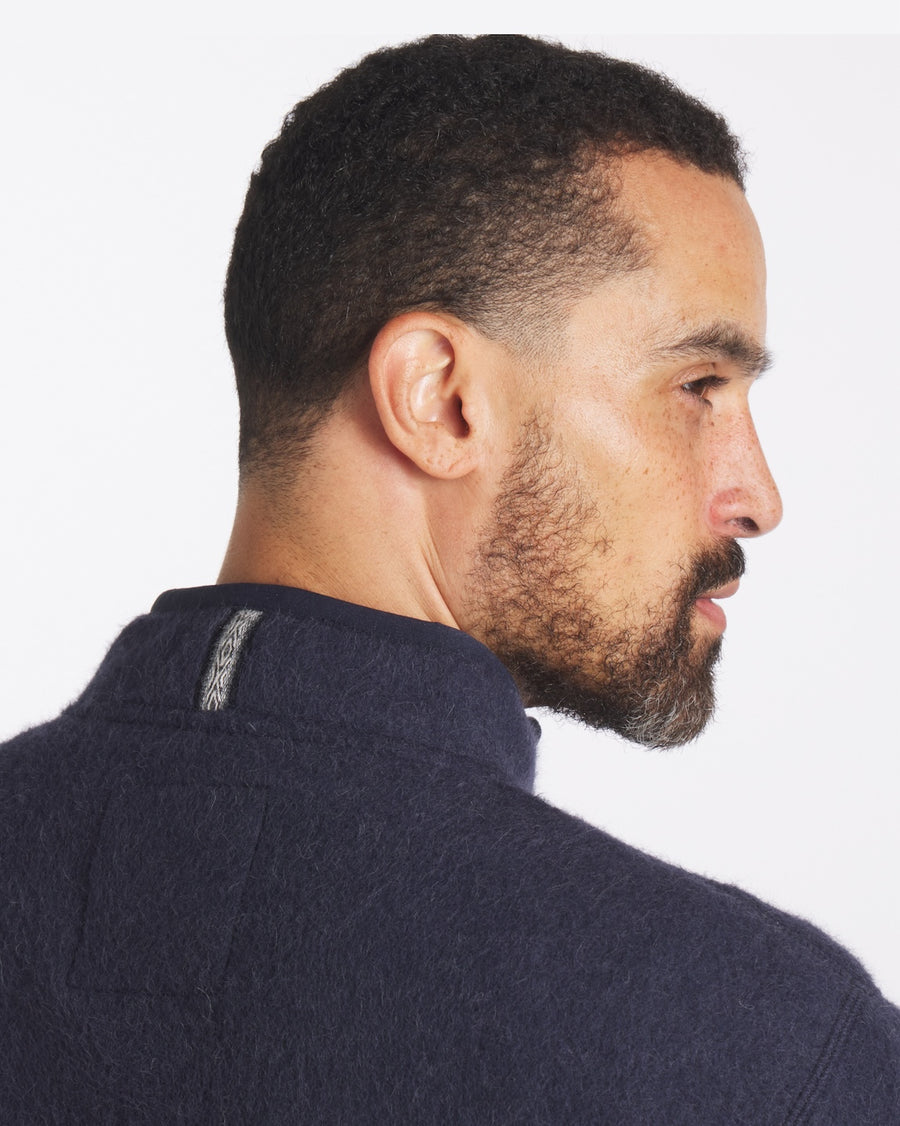 Man wearing Navy fleece