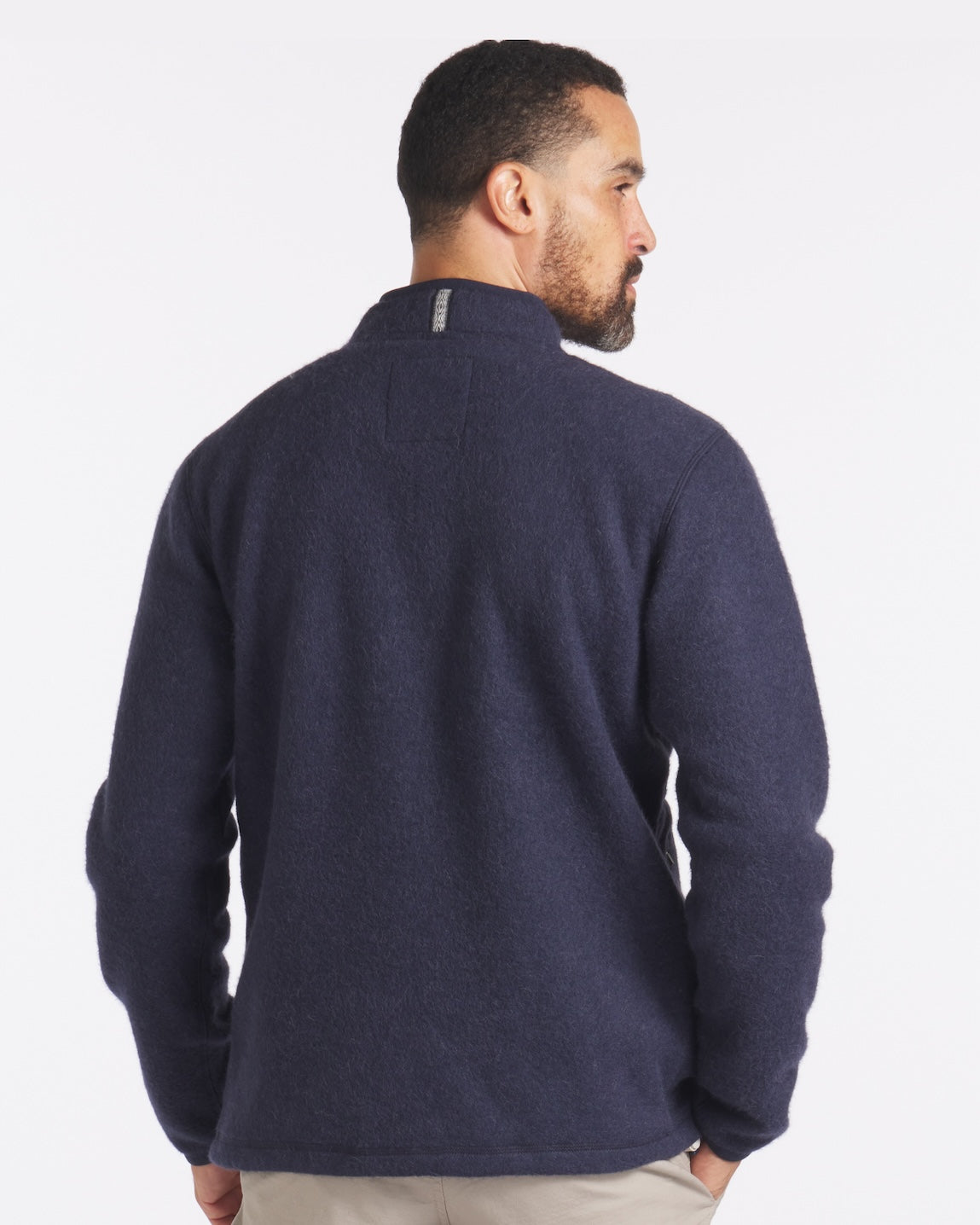 Man wearing navy fleece