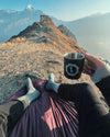 Point of View of Person Wearing PAKA Mountain Crew Alpaca Socks and Drinking Coffee in Front of Intipunku, or “Sun Gate,” at Machu Picchu, Peru