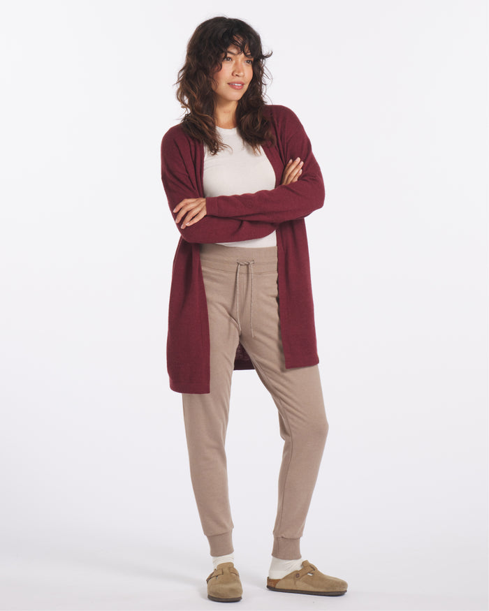 Woman Wearing Lightweight Jogger Pants in Walnut / Tan with Red Cardigan – PAKA Apparel