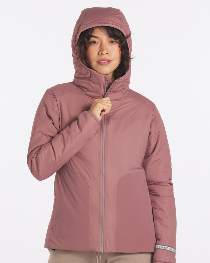 Model Zipping Up Apu Rose / Dark Pink Women's Sustainable Lightweight Puffer Jacket with PAKAFILL® Alpaca Insulation – PAKA Apparel