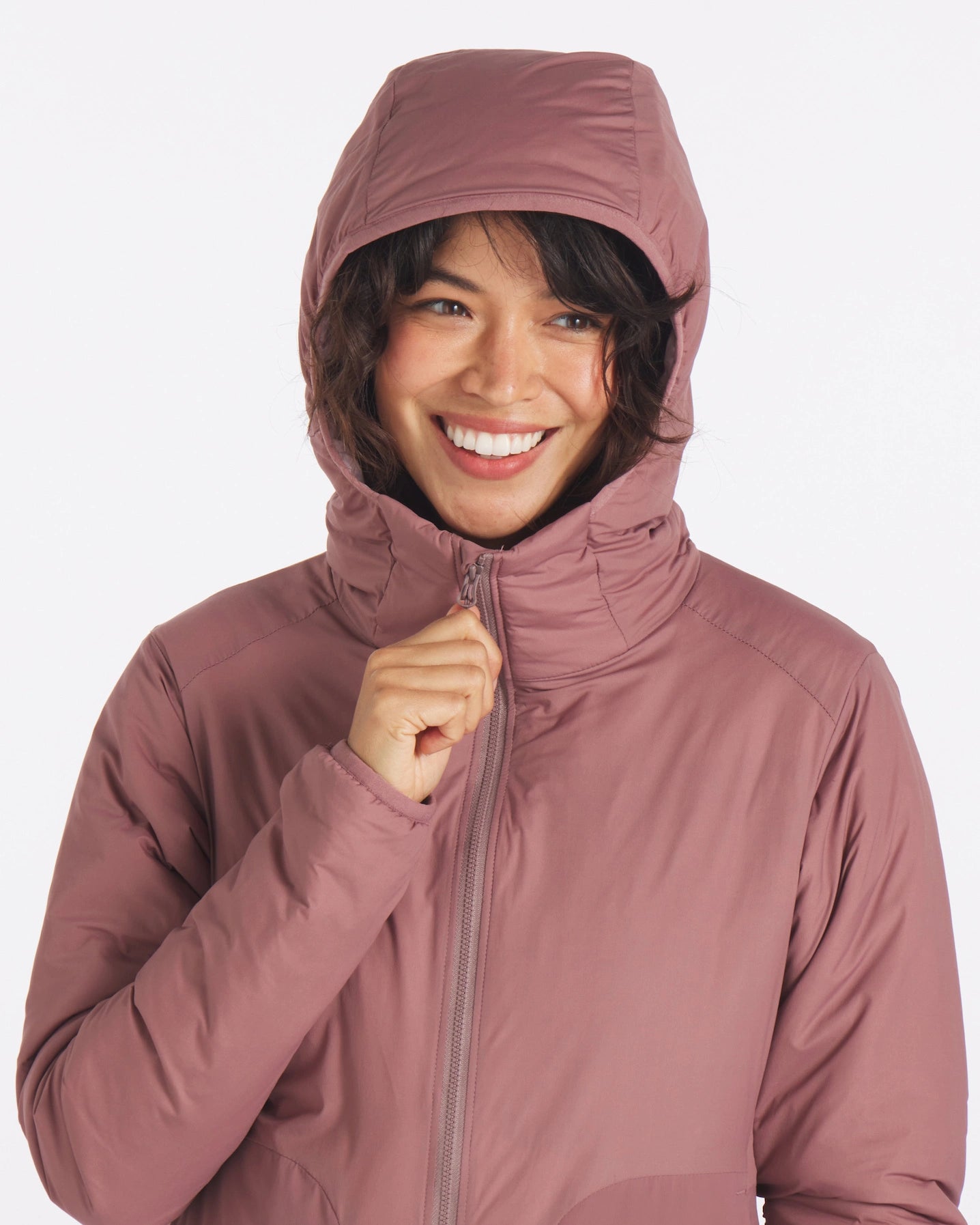 Smiling Woman wearing Women's Apu Lightweight Puffer