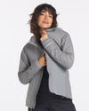 Model Wearing Apu Storm / Grey Women's Natural Lightweight Puffer Jacket with PAKAFILL® Alpaca Fiber Insulation – PAKA Apparel