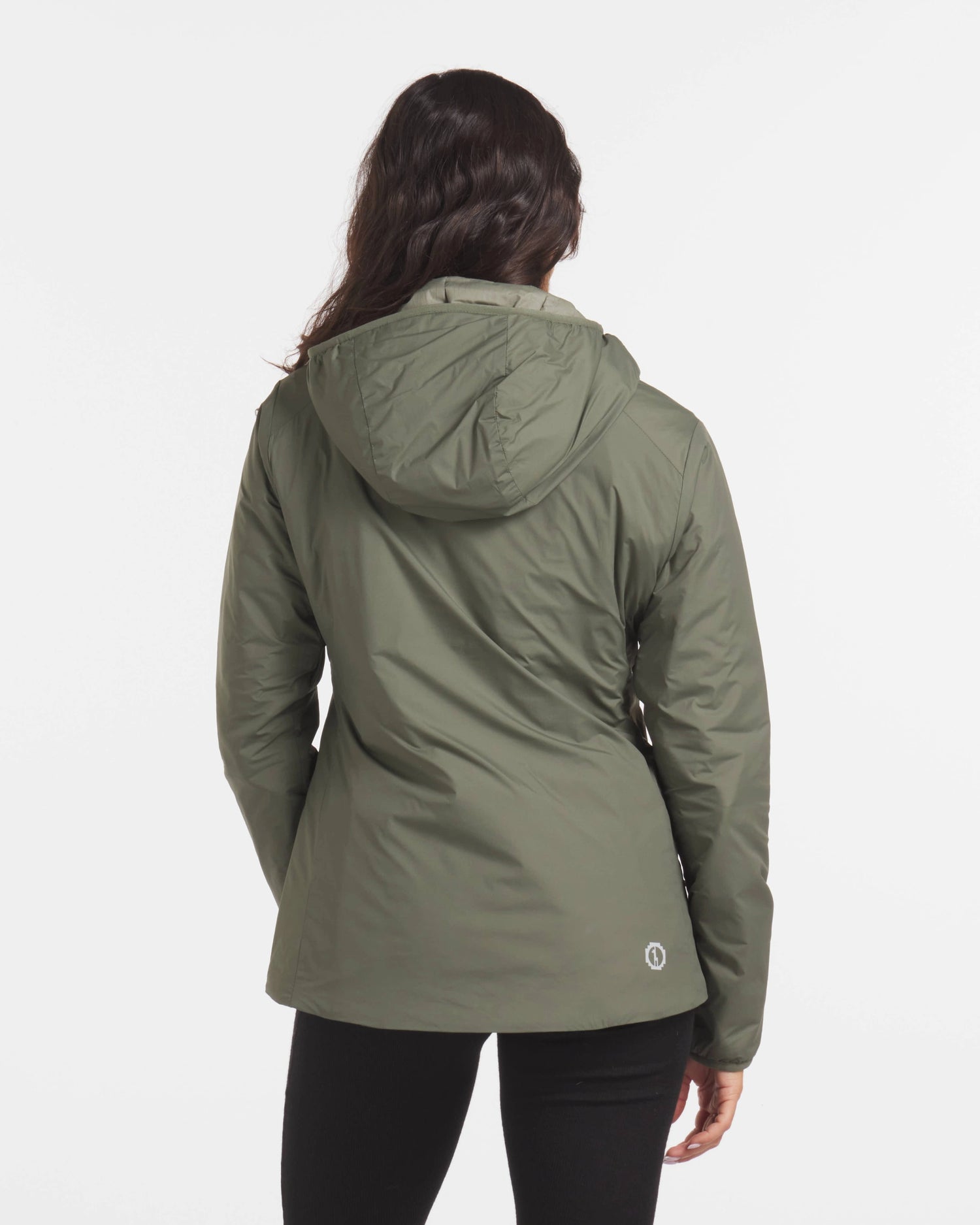 Backside of Model in Thyme / Dark Green Women's Apu Lightweight Hooded Puffer Jacket – PAKA Apparel