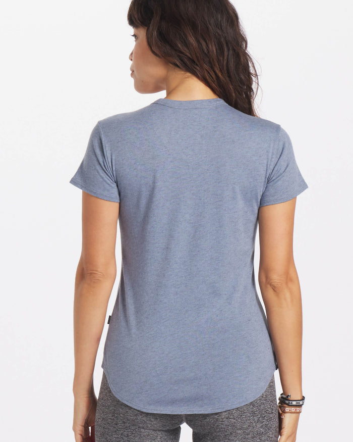 Woman's alpaca tee in blue on model 