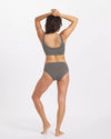 Backside of Woman with Arms Overhead in Forage Grey Sustainable Alpaca Underwear and Bralette – PAKA Apparel