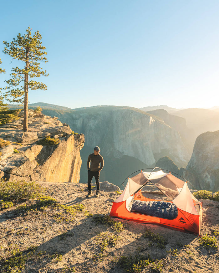 Man camping wearing the vida