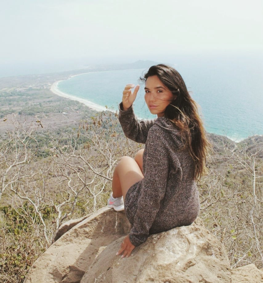 Woman wearing the Vida on a cliff in Puerto Vallarta, Mexico