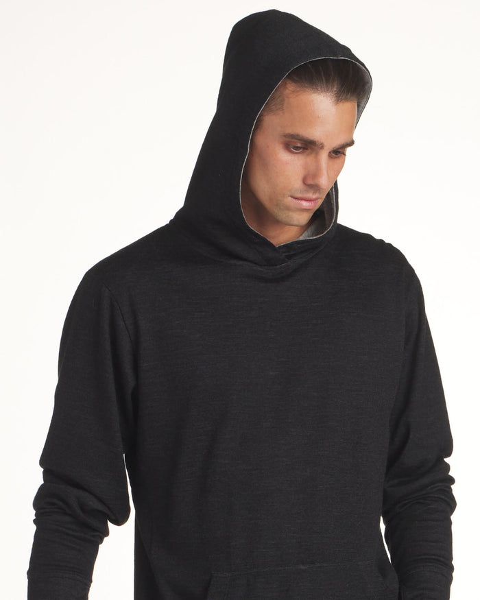 Male model wearing black alpaca hoodie 