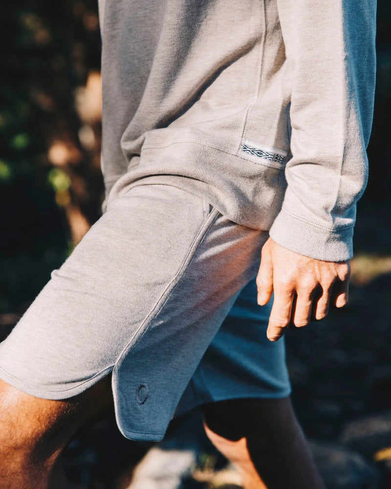 Grey men's alpaca terry shorts on model 