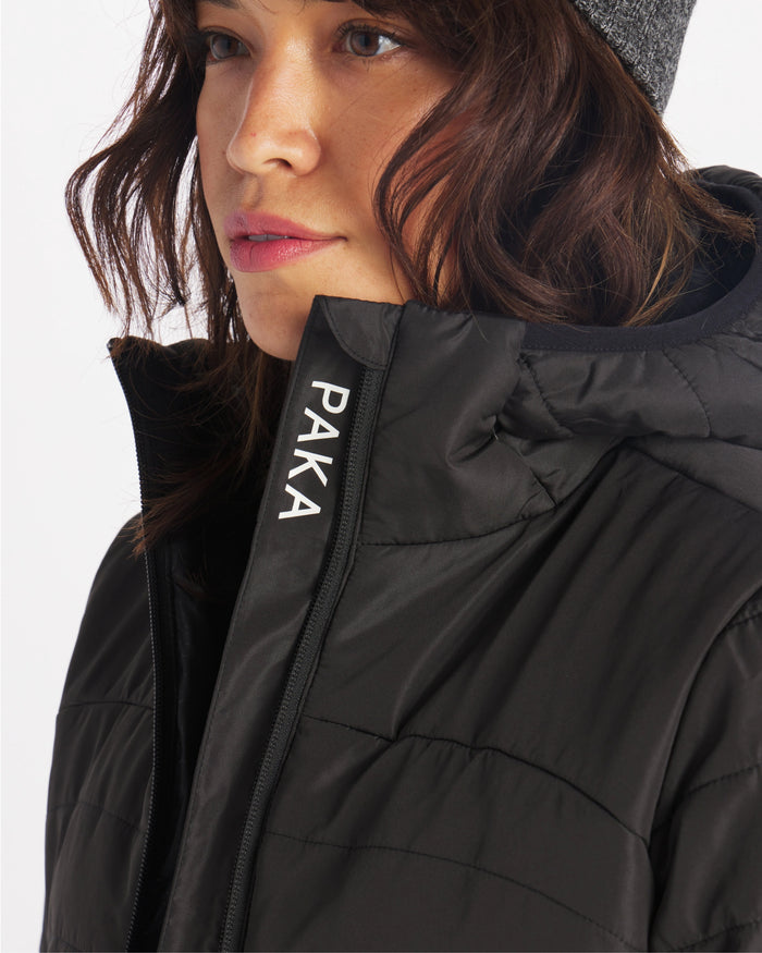 Woman wearing black puffer