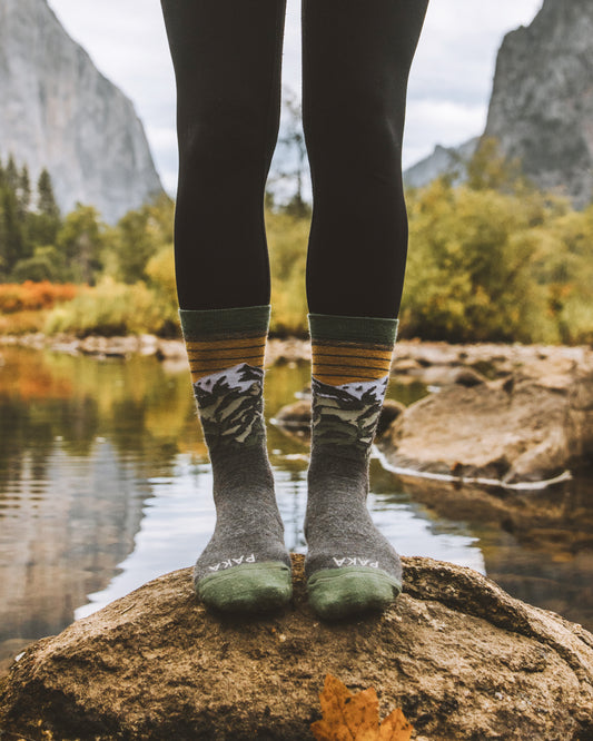 Mountain alpaca socks on model 